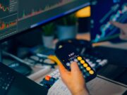 How to Choose a P2P Crypto Platform – Safety, Escrow and Reputation Trader analyzing stock market charts on computer screens with calculator.