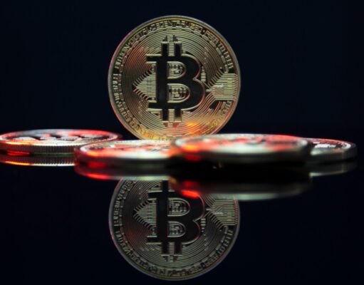 Multi-Party Computation (MPC) in Digital Asset Custody a bit coin sitting on top of a table