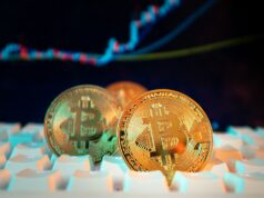 Comparing Crypto Exchanges by Order Types and Advanced Tools Bitcoin coins are displayed with a stock chart.