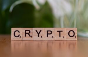 Monitoring, Logging, and SIEM for Crypto Infrastructure A wooden block spelling crypt on a table