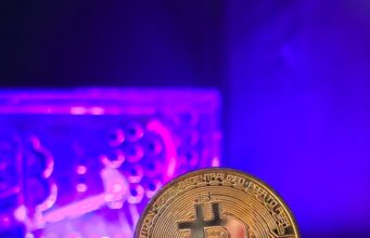 Mastering Crypto Mining – Your Troubleshooting Toolkit a stack of gold bitcoins sitting on top of a table